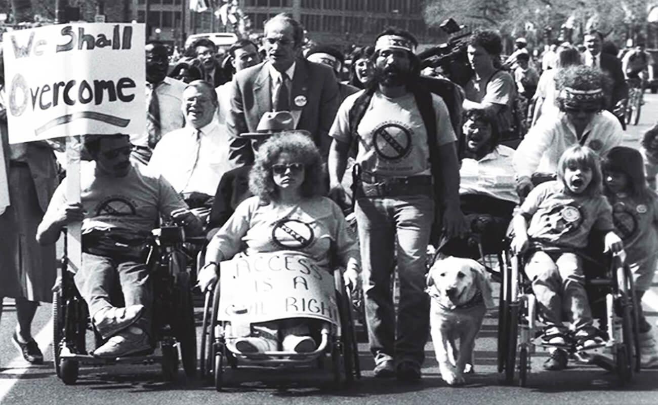 Photo of several demonstrations led by the disability rights group ADAPT served as an impetus to passing the Americans with Disabilities Act.