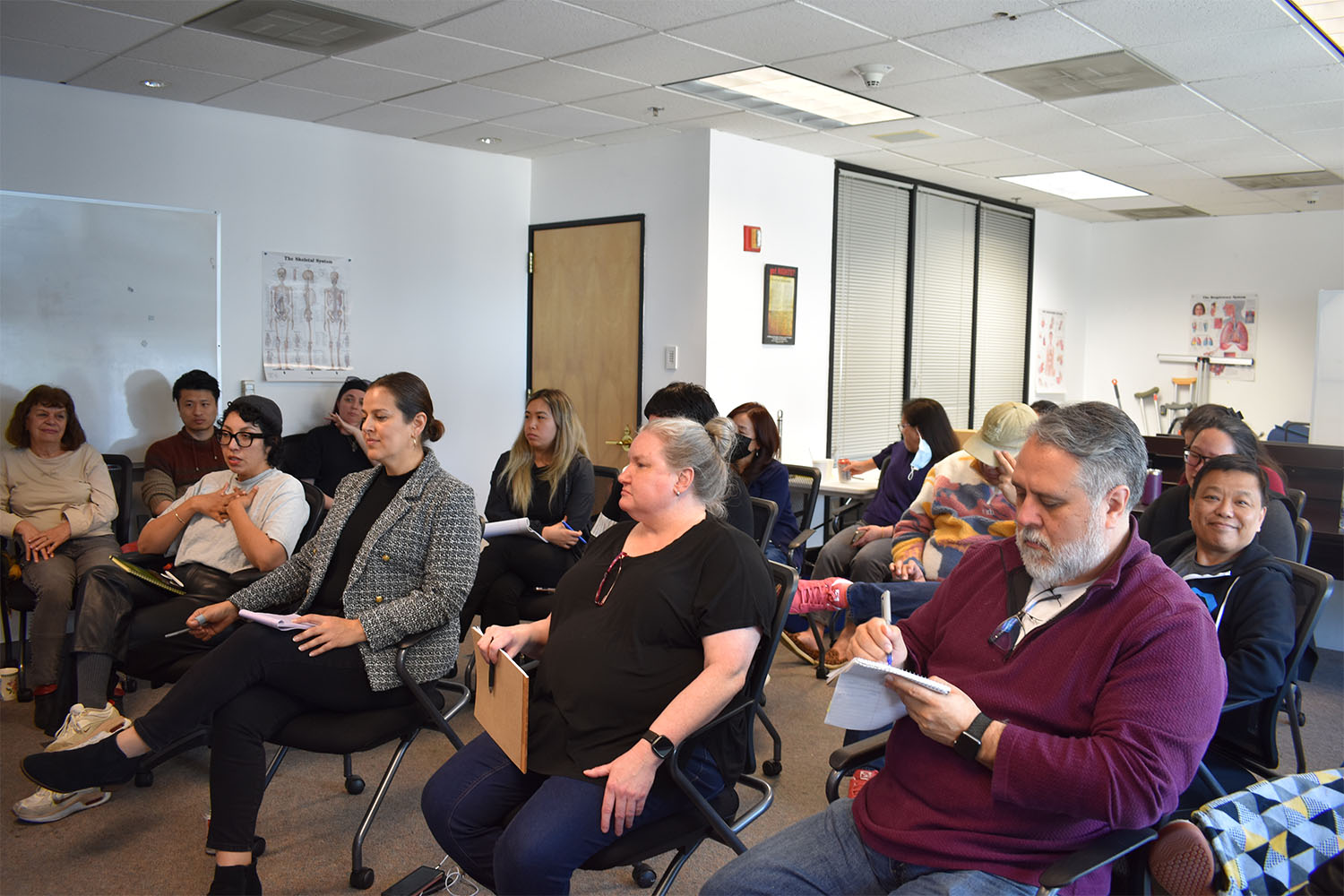 Photo of SFIHSSPA care providers and staff members together at an in-person training course.